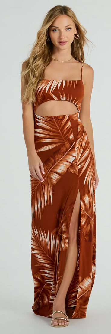 Essential for vacations or summer days, the Island Breeze Tropical Cutout Slit Maxi Dress is a sundress or milkmaid dress with sleek and flirty details.