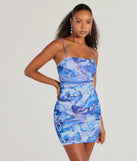 Step into winter chic with the Notice Me Abstract Print Bodycon Mini Dress, a blue mini dress featuring an above-the-knee cut ideal for cocktail parties, festive gatherings, or clubwear.
