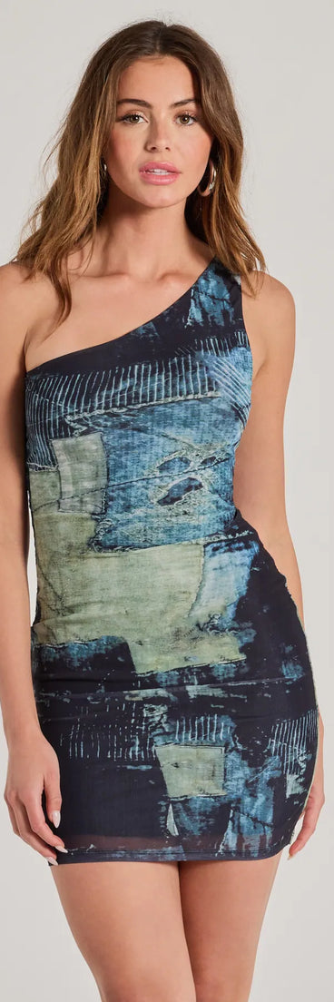 Step into winter chic with the Remarkable Vibe One Shoulder Printed Mesh Mini Dress, a black mini dress featuring an above-the-knee cut ideal for cocktail parties, festive gatherings, or clubwear.