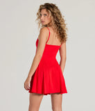 The Truly Charming Sleeveless A-Line Mini Dress is a mini dress in red, perfect for an above-the-knee holiday party dress or a stylish NYE look, with a short hemline designed to make a winter statement.