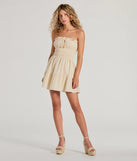 Step into winter chic with the True Devotion Strapless Ruffle Skater Mini Dress, a taupe mini dress featuring an above-the-knee cut ideal for cocktail parties, festive gatherings, or clubwear.