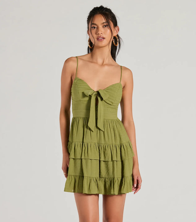 The Charming Allure Tie-Front Ruffled Skater Dress is a mini dress that will make a statement with its short hemline and on-trend details to have you ready for any event!
