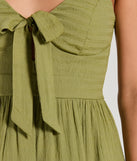 The Charming Allure Tie-Front Ruffled Skater Dress is a mini dress that will make a statement with its short hemline and on-trend details to have you ready for any event!