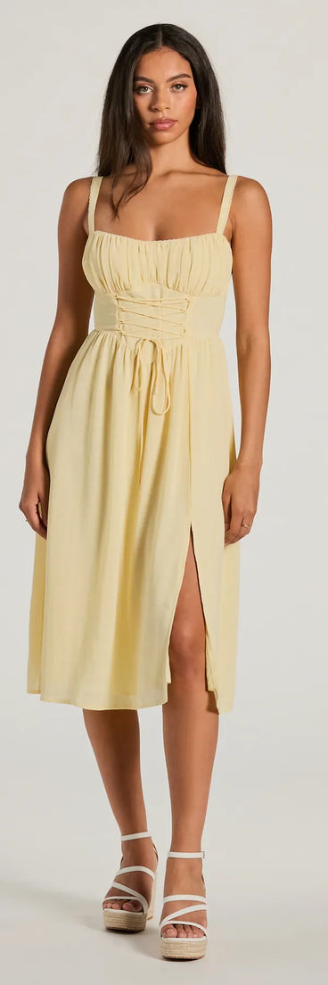 The midi dress length on the Modern Romance Sleeveless Lace-Up A-Line Midi Dress provides an elevated silhouette perfect for any party, occasion, or everyday styling.