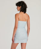 The Dose Of Sweetness Bodycon Floral Mini Dress is a mini dress in light blue, perfect for an above-the-knee holiday party dress or a stylish NYE look, with a short hemline designed to make a winter statement.