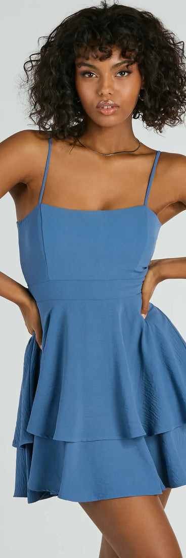 Essential for vacations or summer days, the Divine Cutie Tie Back Ruffled Skater Dress is a sundress or milkmaid dress with sleek and flirty details.