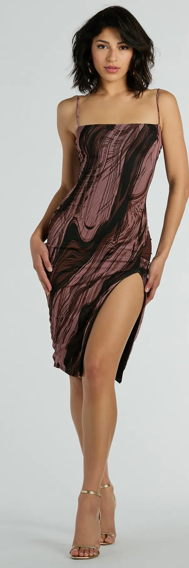 The Abstract Beauty Printed Slit Midi Dress is a casual dress for more than special occasions with a fitted or flowy silhouette and accents in the most recent trends!