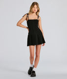 Whether you're headed to brunch or running errands, the Dream Twirl Tie Strap Pleated A-Line Mini Dress in black delivers effortless style in a breathable, go-to casual dress.