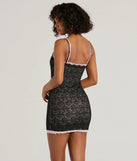 The Admire You Scoop Neck Layered Lace Mini Dress is a mini dress in black, perfect for an above-the-knee holiday party dress or a stylish NYE look, with a short hemline designed to make a winter statement.