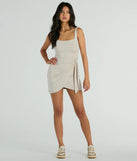Make a bold statement in the Forever Chic Sleeveless Wrap Mini Dress in natural, the perfect spring dress for weddings, cocktail hours, nights out, and/or seasonal celebrations.