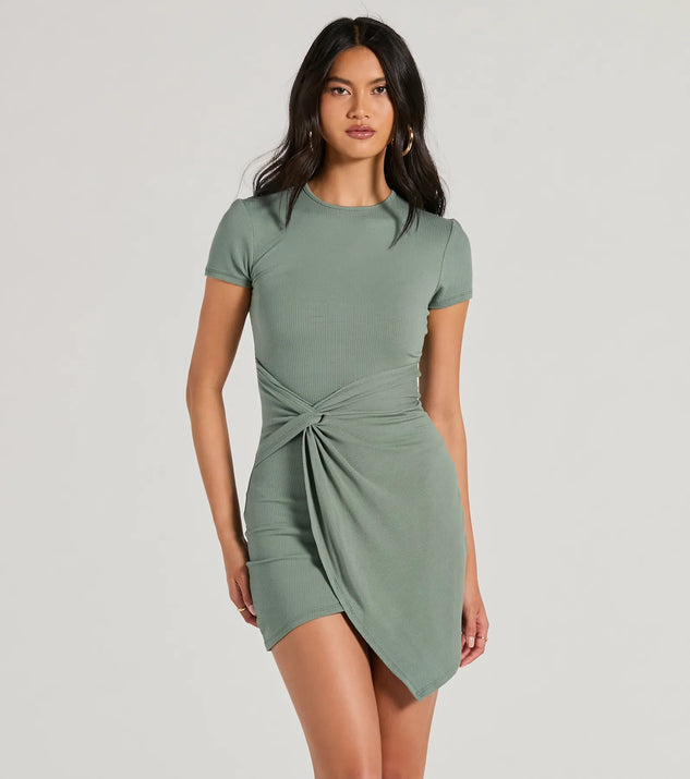 Make a bold statement in the Cutest Spirit Short Sleeve Knot Tie Mini Dress in olive green, the perfect green dress for weddings, cocktail hours, nights out, and/or seasonal celebrations.