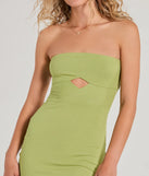 Step into seasonal chic with the Looking Back Strapless Strappy Mini Dress, a lime mini dress featuring an above-the-knee cut ideal for cocktail parties, festive gatherings, or clubwear.