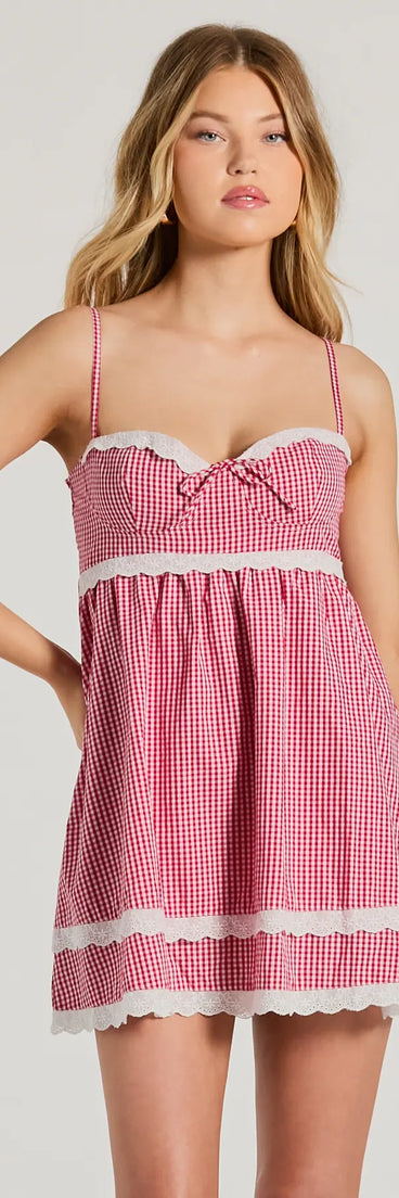 Step into seasonal chic with the Life's A Picnic Sweetheart Lace Gingham Mini Dress, a red mini dress featuring an above-the-knee cut ideal for cocktail parties, festive gatherings, or clubwear.