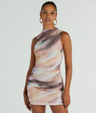 The Set To Amaze Mock Neck Abstract Mini Dress is a mini dress that will make a statement with its short hemline and on-trend details to have you ready for any event!