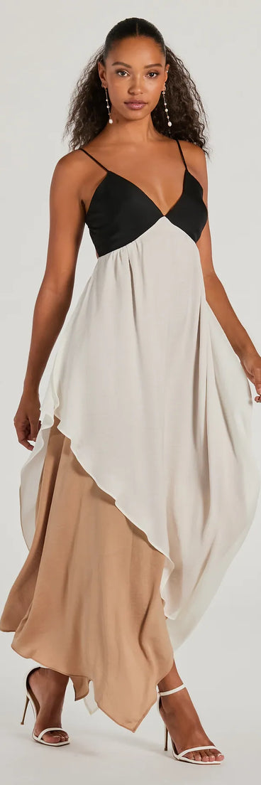 Soak up the season in the Chic Passion V-Neck Color Block Maxi Dress, a black sundress styled for easy days, outdoor plans, and everything in between.