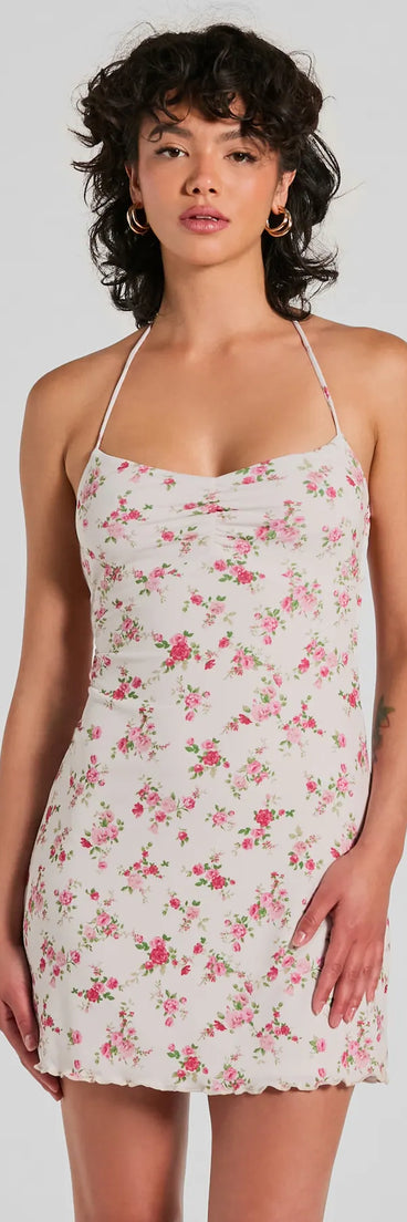 Step into winter chic with the Summer Loving Halter Strappy Floral Mini Dress, a ivory mini dress featuring an above-the-knee cut ideal for cocktail parties, festive gatherings, or clubwear.