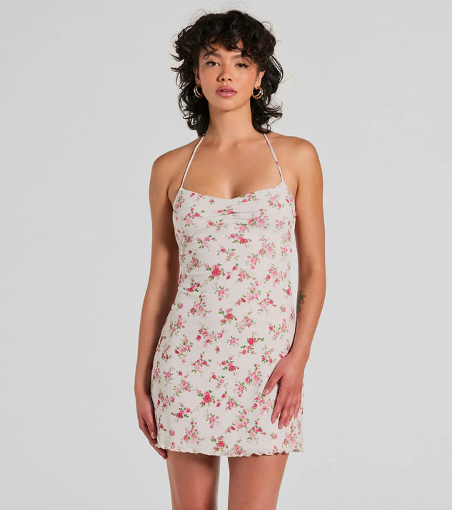 Step into winter chic with the Summer Loving Halter Strappy Floral Mini Dress, a ivory mini dress featuring an above-the-knee cut ideal for cocktail parties, festive gatherings, or clubwear.