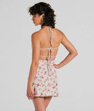 Summer Loving Halter Strappy Floral Mini Dress, a trendy ivory mini dress featuring modern details and a fresh seasonal hue, perfect for creating chic 2025 looks.