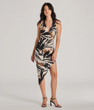 Revamp your 2025 wardrobe with this chic addition, the Island Vibes Tropical Print Asymmetric Midi Dress in taupe, perfect for elevating your style in the new year.