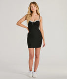 The stunning Desirable Sultry Sweetheart Bow Bodycon Mini Dress provides a chic silhouette and party-ready details that make it a standout black dress for cocktail events, New Year's Eve parties, or as a winter wedding guest look.