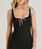 Step into winter chic with the Be My Forever Ribbon Bow Bodycon Mini Dress, a black mini dress featuring an above-the-knee cut ideal for cocktail parties, festive gatherings, or clubwear.