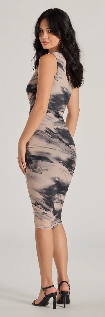 The Endlessly Effortless Crew Neck Abstract Midi Dress in taupe is a women's workwear piece offering a trendy style and unique accents, perfect for effortlessly creating an outfit-of-the-day look that transitions your office look to going-out ready.