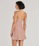 The Perfectly Poised Sweetheart Polka Dot A-Line Dress is a mini dress in peach, perfect for an above-the-knee holiday party dress or a stylish NYE look, with a short hemline designed to make a winter statement.
