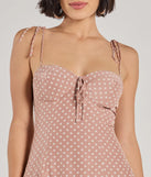 Step into winter chic with the Perfectly Poised Sweetheart Polka Dot A-Line Dress, a peach mini dress featuring an above-the-knee cut ideal for cocktail parties, festive gatherings, or clubwear.