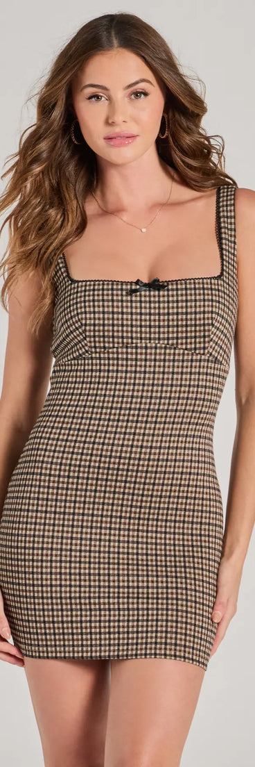 The Flirty Expression Sleeveless Plaid Mini Dress is a mini dress that will make a statement with its short hemline and on-trend details to have you ready for any event!