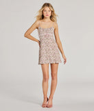 The Sweet Side Lace Trim Floral A-Line Mini Dress is a stunning natural mini dress with a short hem, designed to be the perfect winter cocktail dress or night-out look for the holiday season.