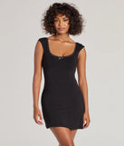 Step into seasonal chic with the Whimsical Glam Bow and Lace Mini Dress, a black mini dress featuring an above-the-knee cut ideal for cocktail parties, festive gatherings, or clubwear.