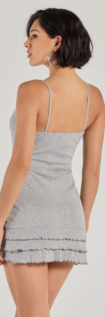 Revamp your 2025 wardrobe with this chic addition, the Sweet Silhouette Rosette Ruffled Knit Mini Dress in heather gray, perfect for elevating your style in the new year.