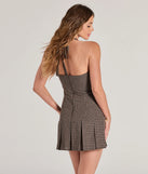 Revamp your 2025 wardrobe with this chic addition, the Pretty In Plaid Drop Waist A-Line Mini Dress in brown, perfect for elevating your style in the new year.