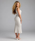 Step into summer looking effortlessly chic in the Pretty Picture Striped Midi Dress in ivory, a must-have Windsor dress for your warm-weather wardrobe.