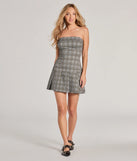 Make a bold statement in the Autumn Attitude Strapless Pleated Plaid Mini Dress in gray, the perfect summer dress for weddings, cocktail hours, nights out, and/or seasonal celebrations.