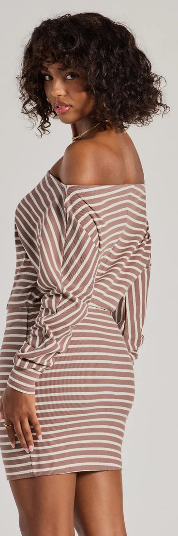 Revamp your 2025 wardrobe with this chic addition, the Stripes In Style Off The Shoulder Mini Dress in taupe, perfect for elevating your style in the new year.