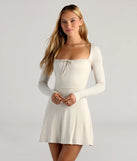 Out And About Long Sleeve Short Dress, a stylish ivory short dress featuring modern details and a fresh seasonal hue, perfect for creating chic 2025 looks.