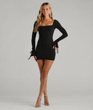 Make a bold statement in the Simply Amazing Long Bell Sleeve Mini Dress in black, the perfect spring dress for weddings, cocktail hours, nights out, and/or seasonal celebrations.