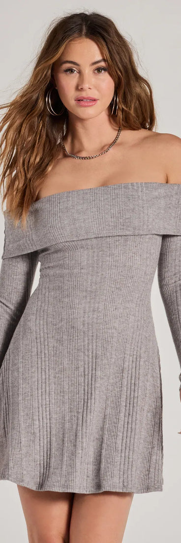 The Cozy Knit Off-The-Shoulder A-Line Mini Dress offers a transitional weather style, with a cozy sweater knit perfect for office wear, casual day outings, or layered outfits.