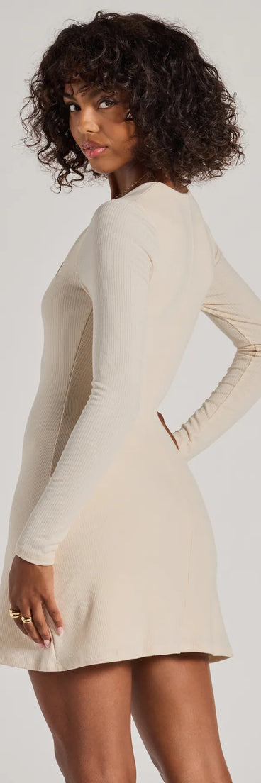 Revamp your 2025 wardrobe with this chic addition, the Casual Luxe Long Sleeve Ribbed Knit Mini Dress in ivory, perfect for elevating your style in the new year.