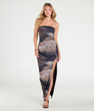 Make a bold statement in the Day To Night Strapless Abstract Slit Maxi Dress in black, the perfect spring dress for weddings, cocktail hours, nights out, and/or seasonal celebrations.