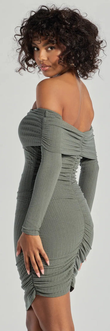 Revamp your 2025 wardrobe with this chic addition, the Flawless Style Knit Off-The-Shoulder Long Sleeve Mini Dress in olive green, perfect for elevating your style in the new year.