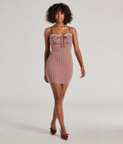 Make a bold statement in the Flirty Silhouette Lace Trim Plaid Mini Dress in burgundy, the perfect summer dress for weddings, cocktail hours, nights out, and/or seasonal celebrations.