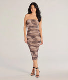 With its mid-calf hem and popular flattering fit, the Mesmerizing Glam Abstract Ruched Midi Dress in taupe nails the balance of trend and ease, redefining go-to midi dresses for any occasion.