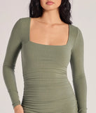 Make a bold statement in the Always A Good Time Long Sleeve Midi Dress in olive green, the perfect green dress for weddings, cocktail hours, nights out, and/or seasonal celebrations.