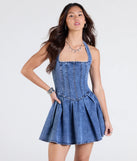 Step into summer looking effortlessly chic in the Darling Charm Halter Pleated Denim Skater Dress in denim blue, a must-have Windsor dress for your warm-weather wardrobe.
