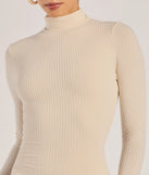 Step into milestone moments with the The Essential High-Slit Ribbed Knit Midi Dress, a standout in ivory dresses perfect for birdal showers, Easter celebrations, and 2025 grad looks.