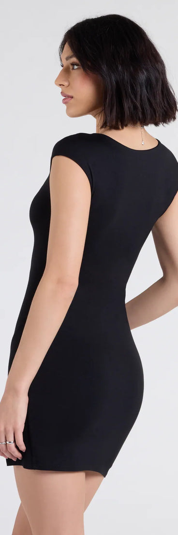 Flaunt your silhouette in the tight Chic Girl Short Sleeve Bodycon Slit Mini Dress in black, a bodycon dress that empowers your look with bold style and effortless edge.