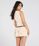 Make a bold statement in the Polished Demure Belted Pleated Skater Dress in natural, the perfect spring dress for weddings, cocktail hours, nights out, and/or seasonal celebrations.