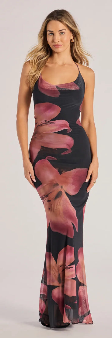 The Pretty Blooms Floral Mesh Halter Maxi Dress is a stylish black floral dress featuring a fresh seasonal print and flattering design, perfect for garden parties, bridal showers, graduation celebrations, or everyday summer styling.